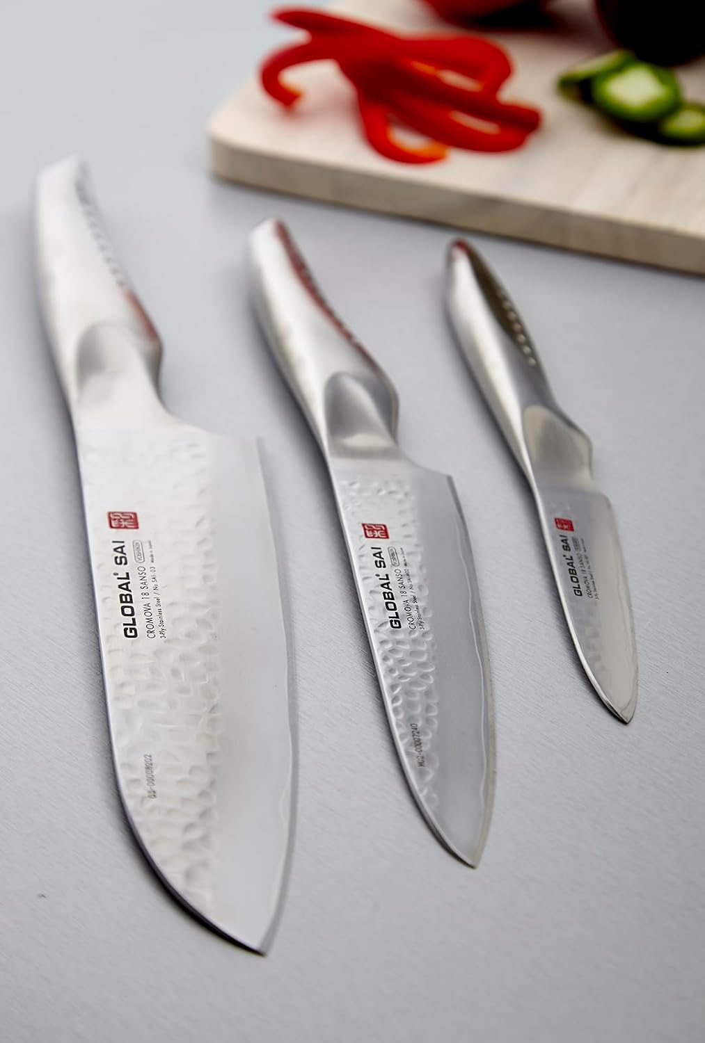 Global SAI 3 Piece Knife Set - 7 1/2 inch Santoku, 6 inch Utility, 3 1/2 inch Paring, Lightweight Japanese Stainless Steel, Razor Sharp Edge, Hand Hammered Blade, Thumb Rest, Made in Japan, SAI-3001