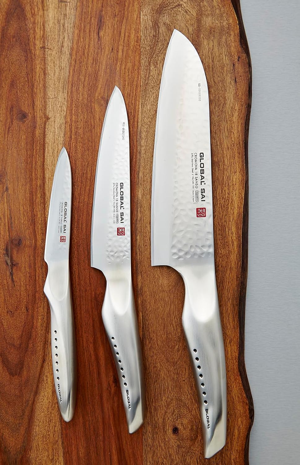 Global SAI 3 Piece Knife Set - 7 1/2 inch Santoku, 6 inch Utility, 3 1/2 inch Paring, Lightweight Japanese Stainless Steel, Razor Sharp Edge, Hand Hammered Blade, Thumb Rest, Made in Japan, SAI-3001