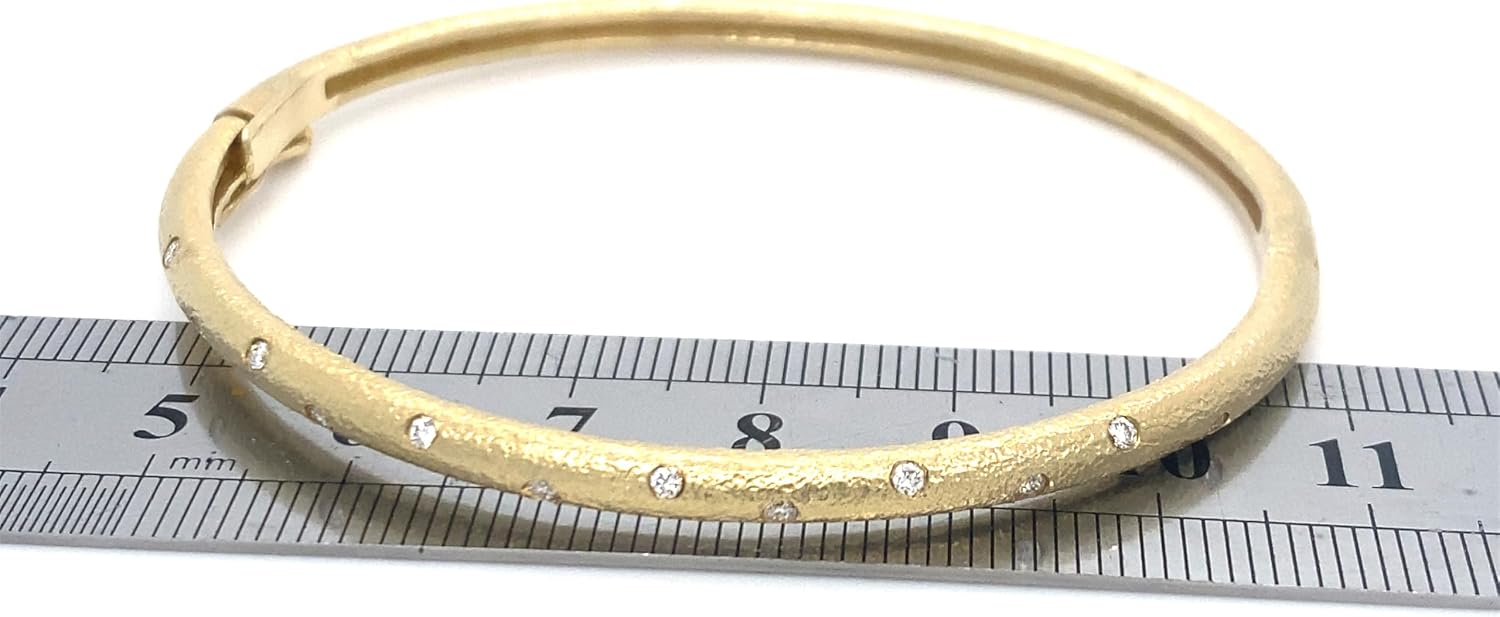 Matte finished hammered gold 14k gold hinged bangle with flush set diamonds in yellow, white or rose gold