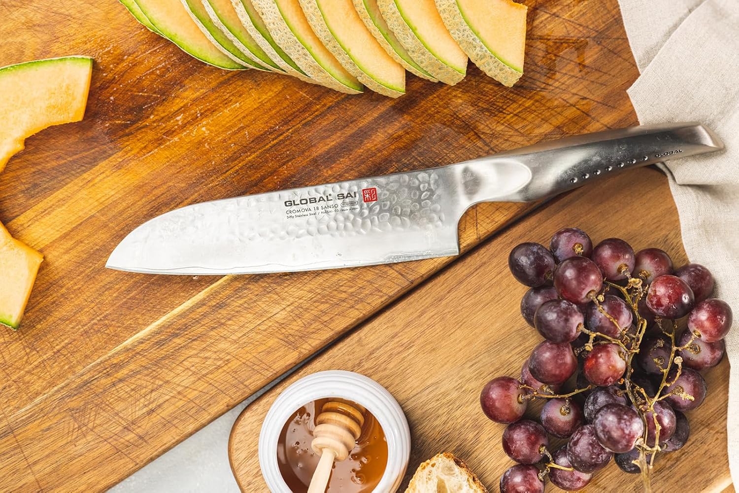 Global SAI 3 Piece Knife Set - 7 1/2 inch Santoku, 6 inch Utility, 3 1/2 inch Paring, Lightweight Japanese Stainless Steel, Razor Sharp Edge, Hand Hammered Blade, Thumb Rest, Made in Japan, SAI-3001